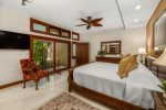 Enjoy a small, private lanai with garden views off of the bedroom